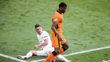 BUDAPEST, HUNGARY - JUNE 27: Denzel Dumfries (22) of Netherlands in action against Lukas Masopust (12) of Czech Republic during the EURO 2020 round of 16 football match between the Netherlands and the Czech Republic at Ferenc Puskas Arena in Budapest, Hungary on June 27, 2021. (Photo by Dmitriy Golubovich/Anadolu Agency via Getty Images)