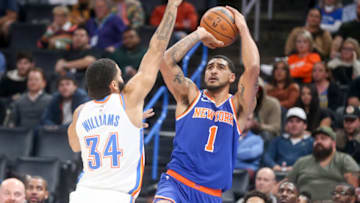 OKLAHOMA CITY, OKLAHOMA - NOVEMBER 21: Obi Toppin #1 of the New York Knicks shoots over Kenrich Williams #34 of the Oklahoma City Thunder during the fourth quarter at Paycom Center on November 21, 2022 in Oklahoma City, Oklahoma. NOTE TO USER: User expressly acknowledges and agrees that, by downloading and or using this photograph, User is consenting to the terms and conditions of the Getty Images License Agreement. (Photo by Ian Maule/Getty Images)