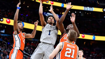 Dec 14, 2019; Washington, DC, USA; Georgetown Hoyas forward Jamorko Pickett (1) shoots the ball over Syracuse Orange forward Elijah Hughes (33) and forward Bourama Sidibe (34) and forward Marek Dolezaj (21) during the second half at Capital One Arena. Mandatory Credit: Brad Mills-USA TODAY Sports