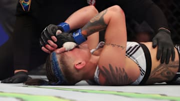 LAS VEGAS, NEVADA - DECEMBER 11: Priscila Cachoeira of Brazil reacts after her defeat to Gillian Robertson during their women's flyweight fight in the UFC 269 event at T-Mobile Arena on December 11, 2021 in Las Vegas, Nevada. (Photo by Carmen Mandato/Getty Images)