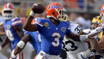 Jan 1, 2016; Orlando, FL, USA; Florida Gators quarterback Treon Harris (3) throws during the third quarter in the 2016 Citrus Bowl against the Michigan Wolverines at Orlando Citrus Bowl Stadium. Michigan Wolverines defeated Florida Gators 41-7. Mandatory Credit: Tommy Gilligan-USA TODAY Sports