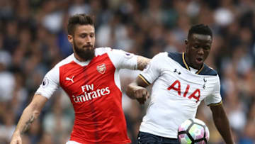 LONDON, ENGLAND - APRIL 30: Olivier Giroud of Arsenal and Victor Wanyama of Tottenham Hotspur battle for possession during the Premier League match between Tottenham Hotspur and Arsenal at White Hart Lane on April 30, 2017 in London, England. (Photo by Julian Finney/Getty Images)