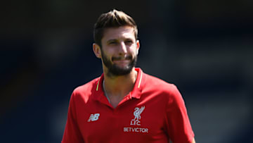 BURY, ENGLAND - JULY 14: Adam Lallana of Liverpool looks on before a pre-season friendly match between Bury and Liverpool at Gigg Lane on July 14, 2018 in Bury, England. (Photo by Nathan Stirk/Getty Images)