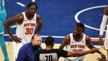 NEW YORK, NEW YORK - MAY 15: Head coach Tom Thibodeau of the New York Knicks reacts after the ball is given to Charlotte Hornets with 11 seconds left in regulation as Julius Randle #30 and Reggie Bullock #25 of the New York Knicks also respond in the fourth quarter at Madison Square Garden on May 15, 2021 in New York City.NOTE TO USER: User expressly acknowledges and agrees that, by downloading and or using this photograph, User is consenting to the terms and conditions of the Getty Images License Agreement. (Photo by Elsa/Getty Images)