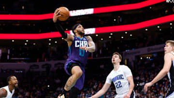 CHARLOTTE, NORTH CAROLINA - JANUARY 14: Miles Bridges #0 of the Charlotte Hornets drives against the Orlando Magic during the second half of their game at Spectrum Center on January 14, 2022 in Charlotte, North Carolina. Orlando won 116-109. NOTE TO USER: User expressly acknowledges and agrees that, by downloading and or using this photograph, User is consenting to the terms and conditions of the Getty Images License Agreement. (Photo by Grant Halverson/Getty Images)