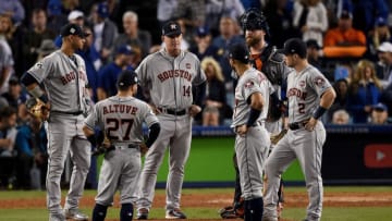LOS ANGELES, CA - OCTOBER 31: Manager A.J. Hinch of the Houston Astros meets with players on the pitcher's mound during the eighth inning against the Los Angeles Dodgers in game six of the 2017 World Series at Dodger Stadium on October 31, 2017 in Los Angeles, California. (Photo by Kevork Djansezian/Getty Images)