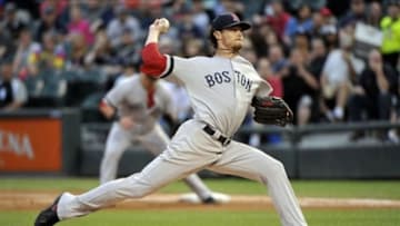 May 22, 2013; Chicago, IL, USA; Boston Red Sox starting pitcher Clay Buchholz (11) delivers a pitch against the Chicago White Sox during the first inning at U.S. Cellular Field. Mandatory Credit: Rob Grabowski-USA TODAY Sports