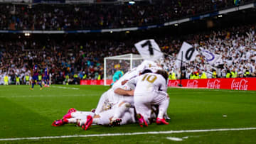 MADRID, SPAIN - MARCH 01: Mariano Diaz of Real Madrid (H) celebrating his goal with his teammates during the Liga match between Real Madrid CF and FC Barcelona at Estadio Santiago Bernabeu on March 1, 2020 in Madrid, Spain. (Photo by Eurasia Sport Images/Getty Images)