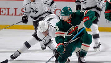 ST. PAUL, MN - OCTOBER 25: Anze Kopitar #11 of the Los Angeles Kings and Matt Read #10 of the Minnesota Wild battle after a face-off during a game between the Minnesota Wild and Los Angeles Kings at Xcel Energy Center on October 25, 2018 in St. Paul, Minnesota.(Photo by Bruce Kluckhohn/NHLI via Getty Images)