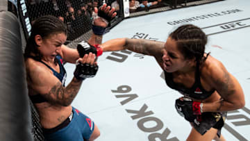 RIO DE JANEIRO, BRAZIL - MAY 12: Amanda Nunes ( R) of Brazil punches Raquel Pennington of the United States in their women's bantamweight bout during the UFC 224 event at Jeunesse Arena on May 12, 2018 in Rio de Janeiro, Brazil. (Photo by Buda Mendes/Zuffa LLC/Zuffa LLC)