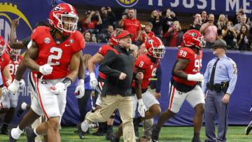 ATLANTA, GA - DECEMBER 03: Head coach Kirby Smart of the Georgia Bulldogs leads the team onto the field prior to the game against the LSU Tigers in the SEC Championship game at Mercedes-Benz Stadium on December 3, 2022 in Atlanta, Georgia. (Photo by Todd Kirkland/Getty Images)