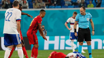 Russia's midfielder Daler Kuzyaev and Belgium's defender Timoty Castagne (Photo by ANATOLY MALTSEV/POOL/AFP via Getty Images)