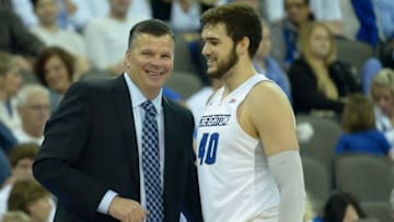 Feb 28, 2016; Omaha, NE, USA; Creighton Bluejays head coach Greg McDermott shares a laugh with forward Zach Hanson (40) against the St. John's Red Storm in the second half at CenturyLink Center Omaha. Creighton defeated St John's 100-59. Mandatory Credit: Steven Branscombe-USA TODAY Sports