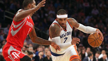 Nov 2, 2016; New York, NY, USA; New York Knicks small forward Carmelo Anthony (7) controls the ball against Houston Rockets small forward Trevor Ariza (1) during the third quarter at Madison Square Garden. Mandatory Credit: Brad Penner-USA TODAY Sports