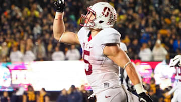 Nov 19, 2016; Berkeley, CA, USA; Stanford Cardinal running back Christian McCaffrey (5) points to the sky in celebration after a touchdown against the California Golden Bears during the fourth quarter at Memorial Stadium. Stanford defeated California 45-31. Mandatory Credit: Kelley L Cox-USA TODAY Sports