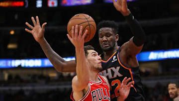 CHICAGO, ILLINOIS - NOVEMBER 21: Zach LaVine #8 of the Chicago Bulls drives against Deandre Ayton #22 of the Phoenix Suns on his way to a game-high 29 points at the United Center on November 21, 2018 in Chicago, Illinois. The Bulls defeated the Suns 124-116. NOTE TO USER: User is consenting to the terms and conditions of the Getty Images License Agreement. (Photo by Jonathan Daniel/Getty Images) (Photo by Jonathan Daniel/Getty Images)