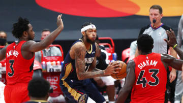 Dec 23, 2020; Tampa, Florida, USA; New Orleans Pelicans forward Brandon Ingram (14) moves to the basket as Toronto Raptors forward Pascal Siakam (43) defends during the second quarter at Amalie Arena. Mandatory Credit: Kim Klement-USA TODAY Sports
