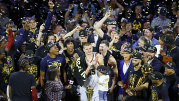 DENVER, COLORADO - JUNE 12: Nikola Jokic #15 of the Denver Nuggets is presented the Bill Russell NBA Finals Most Valuable Player Award after a 94-89 victory against the Miami Heat in Game Five of the 2023 NBA Finals to win the NBA Championship at Ball Arena on June 12, 2023 in Denver, Colorado. NOTE TO USER: User expressly acknowledges and agrees that, by downloading and or using this photograph, User is consenting to the terms and conditions of the Getty Images License Agreement. (Photo by Justin Edmonds/Getty Images)