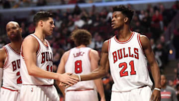 Dec 31, 2016; Chicago, IL, USA; Chicago Bulls guard/forward Jimmy Butler (21) celebrates with teammates during the first half against the Milwaukee Bucks at United Center. Mandatory Credit: Patrick Gorski-USA TODAY Sports