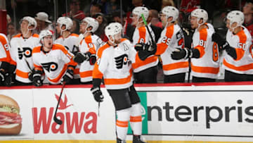 NEWARK, NJ - NOVEMBER 1: Sean Couturier #14 of the Philadelphia Flyers celebrates his game deciding goal in a shoot out during the game against the New Jersey Devils at the Prudential Center on November 1, 2019 in Newark, New Jersey. The Flyers defeated the Devils 4-3. (Photo by Andy Marlin/NHLI via Getty Images)