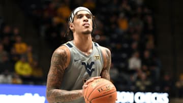 MORGANTOWN, WEST VIRGINIA - JANUARY 11: Jalen Bridges #11 of the West Virginia Mountaineers takes a foul shot during a college basketball game against the Oklahoma State Cowboys at the WVU Coliseum on January 11, 2022 in Morgantown, West Virginia. (Photo by Mitchell Layton/Getty Images)