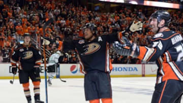 Apr 16, 2014; Anaheim, CA, USA; Anaheim Ducks defenseman Hampus Lindholm (47), right wing Teemu Selanne (8) and defenseman Francois Beauchemin (23) celebrate after a Ducks goal in the second period against the Dallas Stars in game one of the first round of the 2014 Stanley Cup Playoffs at Honda Center. Mandatory Credit: Kirby Lee-USA TODAY Sports