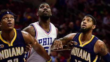 PHILADELPHIA, PA - APRIL 10: (L-R) Myles Turner #33 of the Indiana Pacers Alex Poythress #5 of the Philadelphia 76ers and Paul George #13 of the Indiana Pacers eye a free throw during the first quarter at the Wells Fargo Center on April 10, 2017 in Philadelphia, Pennsylvania. The Pacers won 120-111. NOTE TO USER: User expressly acknowledges and agrees that, by downloading and or using this photograph, User is consenting to the terms and conditions of the Getty Images License Agreement. (Photo by Corey Perrine/Getty Images)
