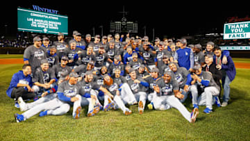 CHICAGO, IL - OCTOBER 19: The Los Angeles Dodgers pose after defeating the Chicago Cubs 11-1 in game five of the National League Championship Series at Wrigley Field on October 19, 2017 in Chicago, Illinois. The Dodgers advance to the 2017 World Series. (Photo by Jamie Squire/Getty Images)