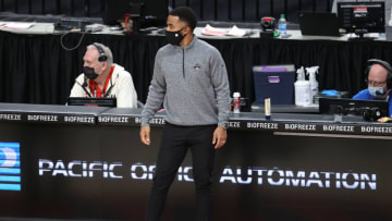 PORTLAND, OREGON - JANUARY 24: Associate Head Coach Johnnie Bryant of the New York Knicks looks on in the fourth quarter against the Portland Trail Blazers at Moda Center on January 24, 2021 in Portland, Oregon. NOTE TO USER: User expressly acknowledges and agrees that, by downloading and or using this photograph, User is consenting to the terms and conditions of the Getty Images License Agreement. (Photo by Abbie Parr/Getty Images)