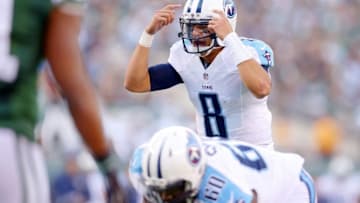 Dec 13, 2015; East Rutherford, NJ, USA; Tennessee Titans quarterback Marcus Mariota (8) signals at the line against the New York Jets during the third quarter at MetLife Stadium. The Jets defeated the Titans 30-8. Mandatory Credit: Brad Penner-USA TODAY Sports