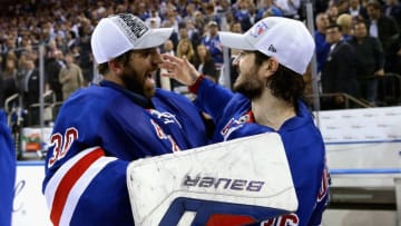 NEW YORK, NY - MAY 29: Henrik Lundqvist #30 and Mats Zuccarello #36 of the New York Rangers celebrates after defeating the Montreal Canadiens in Game Six to win the Eastern Conference Final in the 2014 NHL Stanley Cup Playoffs at Madison Square Garden on May 29, 2014 in New York City.Rangers defeated the Candiens 1-0. (Photo by Bruce Bennett/Getty Images)