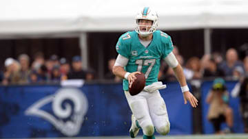 November 20, 2016; Los Angeles, CA, USA; Miami Dolphins quarterback Ryan Tannehill (17) runs the ball against the Los Angeles Rams during the first half at Los Angeles Memorial Coliseum. Mandatory Credit: Gary A. Vasquez-USA TODAY Sports
