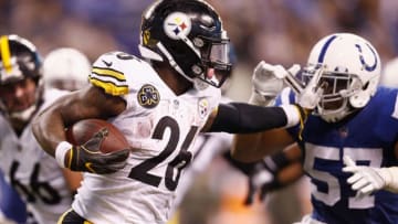 INDIANAPOLIS, IN - NOVEMBER 12: Le'Veon Bell #26 of the Pittsburgh Steelers stiff arms Jon Bostic #57 of the Indianapolis Colts during the second half at Lucas Oil Stadium on November 12, 2017 in Indianapolis, Indiana. (Photo by Andy Lyons/Getty Images)