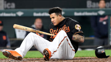BALTIMORE, MD - APRIL 27: Manny Machado #13 of the Baltimore Orioles falls to the ground after avoiding a pitch in the eighth inning against the Detroit Tigers at Oriole Park at Camden Yards on April 27, 2018 in Baltimore, Maryland. (Photo by Greg Fiume/Getty Images)
