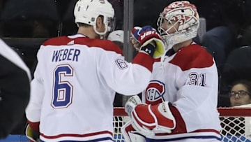 NEW YORK, NEW YORK - DECEMBER 06: Shea Weber #6 and Carey Price #31 of the Montreal Canadiens celebrate a 2-1 victory over the New York Rangers at Madison Square Garden on December 06, 2019 in New York City. (Photo by Bruce Bennett/Getty Images)