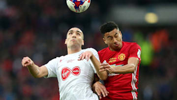 LONDON, ENGLAND - FEBRUARY 26: Jesse Lingard of Manchester United and Oriol Romeu of Southampton jump for the ball during the EFL Cup Final match between Manchester United and Southampton at Wembley Stadium on February 26, 2017 in London, England. (Photo by Alex Livesey/Getty Images)
