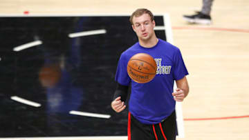LOS ANGELES, CALIFORNIA - FEBRUARY 07: Luke Kennard #5 of the LA Clippers warms up before the game against the Sacramento Kings at Staples Center on February 07, 2021 in Los Angeles, California. NOTE TO USER: User expressly acknowledges and agrees that, by downloading and or using this photograph, User is consenting to the terms and conditions of the Getty Images License Agreement. (Photo by Meg Oliphant/Getty Images)