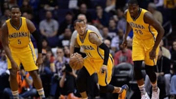 Jan 19, 2016; Phoenix, AZ, USA; Indiana Pacers guard Monta Ellis (11) dribbles the ball up the court in front of teammates forward Lavoy Allen (5) and center Ian Mahinmi (28) in the first half at Talking Stick Resort Arena. Mandatory Credit: Jennifer Stewart-USA TODAY Sports