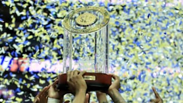 NASHVILLE, TENNESSEE - MARCH 17: The Auburn Tigers hold the winner's trophy after the 84-64 win against the Tennessee Volunteers during the final of the SEC Basketball Championships at Bridgestone Arena on March 17, 2019 in Nashville, Tennessee. (Photo by Andy Lyons/Getty Images)