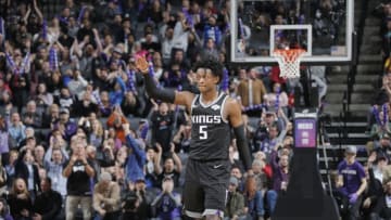 SACRAMENTO, CA - DECEMBER 12: De'Aaron Fox #5 of the Sacramento Kings reacts against the Minnesota Timberwolves on December 12, 2018 at Golden 1 Center in Sacramento, California. NOTE TO USER: User expressly acknowledges and agrees that, by downloading and or using this Photograph, user is consenting to the terms and conditions of the Getty Images License Agreement. Mandatory Copyright Notice: Copyright 2018 NBAE (Photo by Rocky Widner/NBAE via Getty Images)