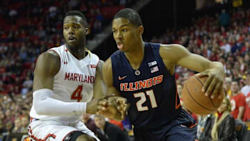Mar 3, 2016; College Park, MD, USA; Illinois Fighting Illini guard Malcolm Hill (21) drives to the basket as Maryland Terrapins forward Robert Carter (4) defends during the first half at Xfinity Center. Mandatory Credit: Tommy Gilligan-USA TODAY Sports