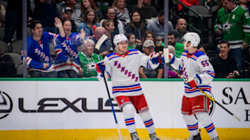New York Rangers defenseman Adam Fox (23) and defenseman Ryan Lindgren (55) . Mandatory Credit: Jerome Miron-USA TODAY Sports