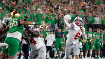 Sep 23, 2023; South Bend, Indiana, USA; Ohio State Buckeyes quarterback Kyle McCord (6) makes a throw to Emeka Egbuka (2) against Notre Dame Fighting Irish on the last drive of the game during the fourth quarter of their game at Notre Dame Stadium.