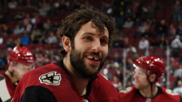 GLENDALE, ARIZONA - NOVEMBER 18: Jason Demers #55 of the Arizona Coyotes talks with teammates during a stop in play against the Los Angeles Kings at Gila River Arena on November 18, 2019 in Glendale, Arizona. (Photo by Norm Hall/NHLI via Getty Images)