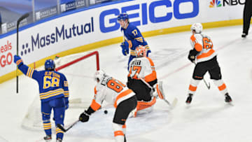 Mar 31, 2021; Buffalo, New York, USA; Buffalo Sabres right wing Victor Olofsson (68) reacts to a goal by center Casey Mittelstadt (37) against the Philadelphia Flyers during the second period at KeyBank Center. Mandatory Credit: Mark Konezny-USA TODAY Sports
