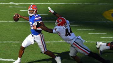 Georgia Bulldogs defensive lineman Travon Walker (44) chases down Florida Gators quarterback Anthony RichardsonImage Credit: Florida Times -Union