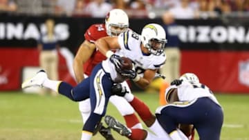 Aug. 24, 2013; Glendale, AZ, USA: San Diego Chargers linebacker Andrew Gachkar (59) intercepts the ball against the Arizona Cardinals during a preseason game at University of Phoenix Stadium. Mandatory Credit: Mark J. Rebilas-USA TODAY Sports