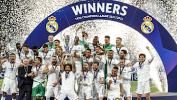 PARIS - Real Madrid goalkeeper Thibaut Courtois, Daniel Carvajal of Real Madrid, Eder Militao of Real Madrid, David Alaba of Real Madrid, Jesus Vallejo of Real Madrid, Nacho of Real Madrid, Eden Hazard of Real Madrid, Toni Kroos of Real Madrid, Karim Benzema of Real Madrid, Luka Modric of Real Madrid, Marco Asensio of Real Madrid, Marcelo of Real Madrid, Real Madrid goalkeeper Andriy Lunin, Casemiro of Real Madrid, Federico Valverde of Real Madrid, Luka Jovic of Real Madrid, Lucas Vazquez of Real Madrid , Gareth Bale of Real Madrid, Eduardo Camavinga of Real Madrid, Vinicius Junior of Real Madrid, Rodrygo of Real Madrid, Isco of Real Madrid, Ferland Mendy of Real Madrid, Mariano Diaz of Real Madrid, Real Madrid goalkeeper Luis Lopez, Real Madrid goalkeeper Javier Belman, Real Madrid coach Carlo Ancelotti with UEFA Champions League trophy, Coupe des clubs Champions Europeans during the UEFA Champions League final match between Liverpool FC and Real Madrid at Stade de Franc on May 28, 202 2 in Paris, France. ANP | DUTCH HEIGHT | MAURICE VAN STONE (Photo by ANP via Getty Images)