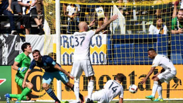Sep 25, 2016; Carson, CA, USA; Seattle Sounders forward Jordan Morris (13) reacts after scoring a goal past Los Angeles Galaxy goalkeeper Brian Rowe (12) and the defense in the second half of the game at StubHub Center. Seattle won 3-2. Mandatory Credit: Jayne Kamin-Oncea-USA TODAY Sports