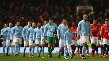 MANCHESTER, ENGLAND - DECEMBER 10: Vincent Kompany of Manchester City leads out his team during the Premier League match between Manchester United and Manchester City at Old Trafford on December 10, 2017 in Manchester, England. (Photo by Michael Steele/Getty Images)